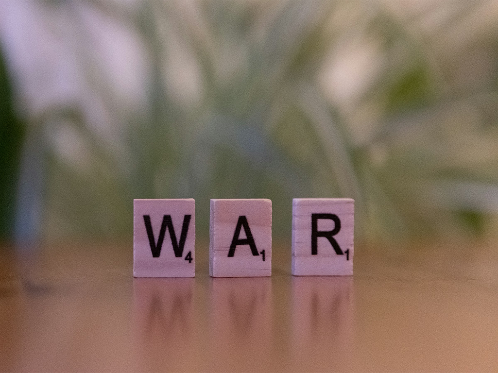 W-A-R Scrabble tiles